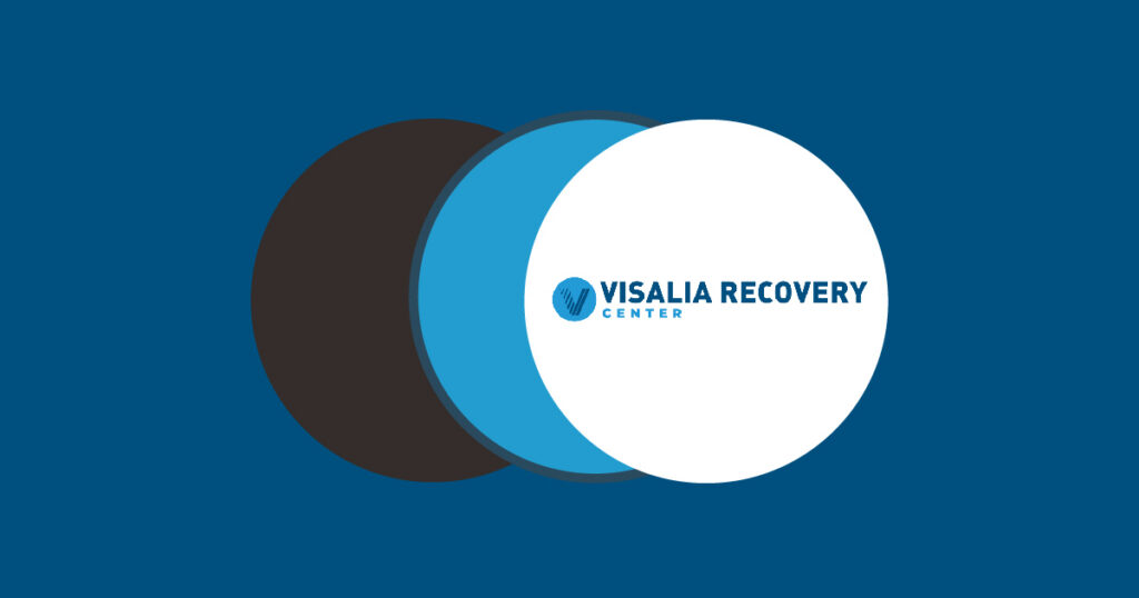 Logo for Visalia Recovery Center with three overlapping circles (black, blue, white) on a navy background.
